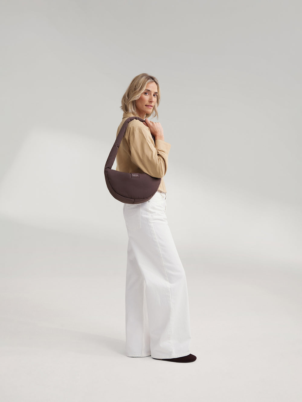 Puffy Mini Cross Body Bag | Brown